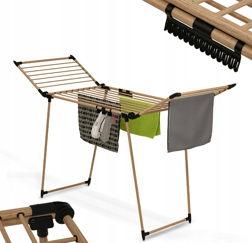 stilinga ir išvaizdi rudos spalvos skalbinių džiovyklė su rūbais ant jos