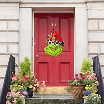 Medinis Kalėdų ženklas su išdykusia veido išraiška – durų ar sienos dekoras